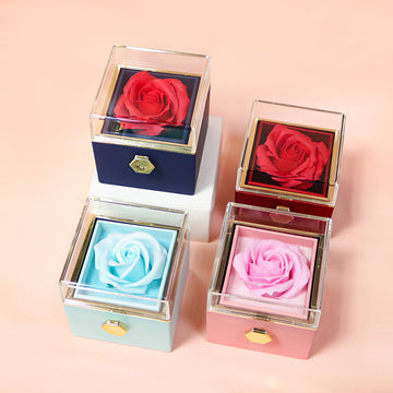Elegant rotating rose jewelry gift box featuring an eternal red soap flower with a hidden compartment for necklaces or rings.