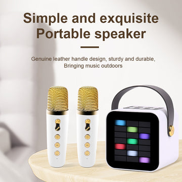 Compact black portable voice amplifier with a wired headset microphone, featuring a digital display and control buttons for classroom teaching.
