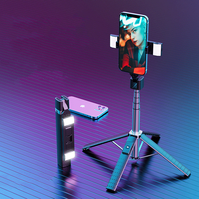 Professional quadrupod selfie stick tripod with four-point base, dual LED fill lights, and a wireless Bluetooth remote for stable vlogging.