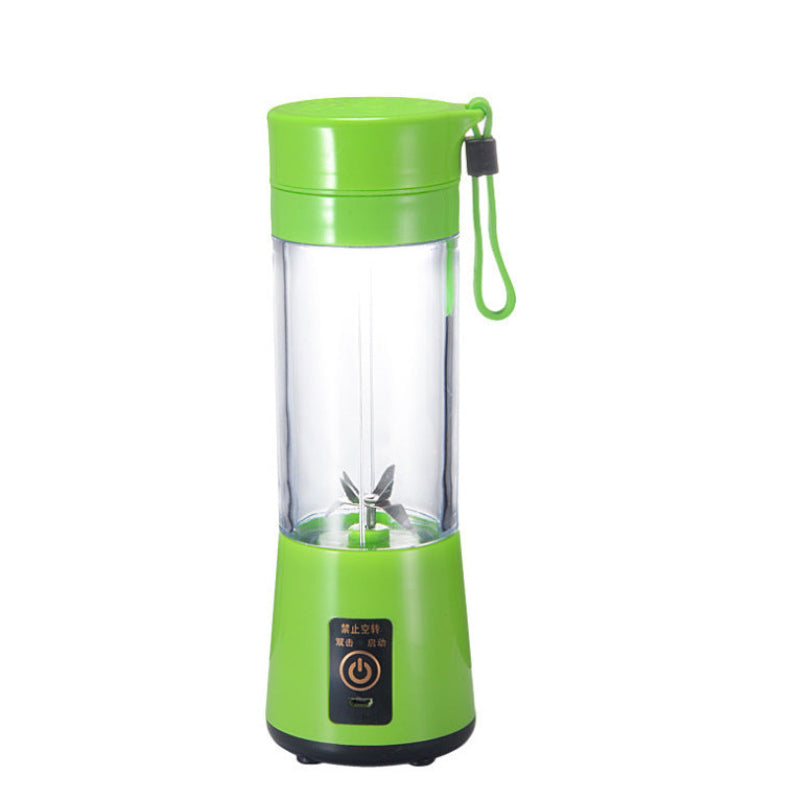 Green portable blender with clear container on a white background
