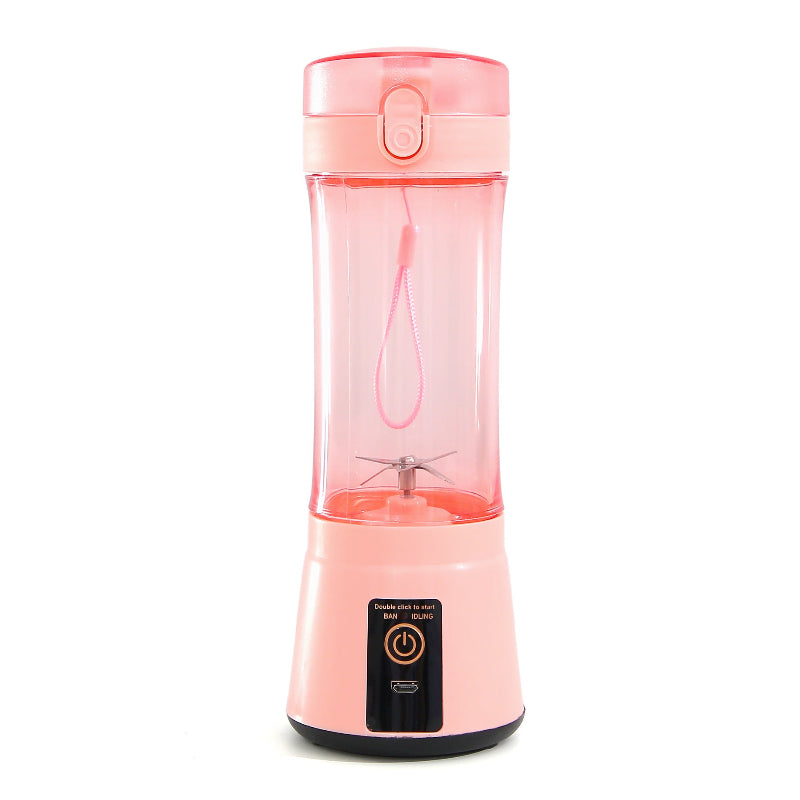 Pink portable blender on a white background