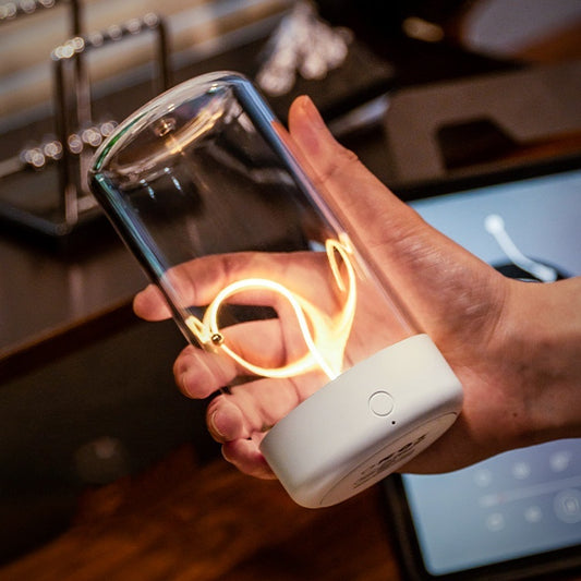 Vintage-style rechargeable LED camping lantern in black with a hanging hook, providing warm atmosphere light for outdoor tents and hiking.