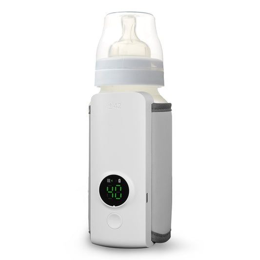 Compact portable baby bottle warmer with digital LCD display showing temperature and USB charging cable for travel use.