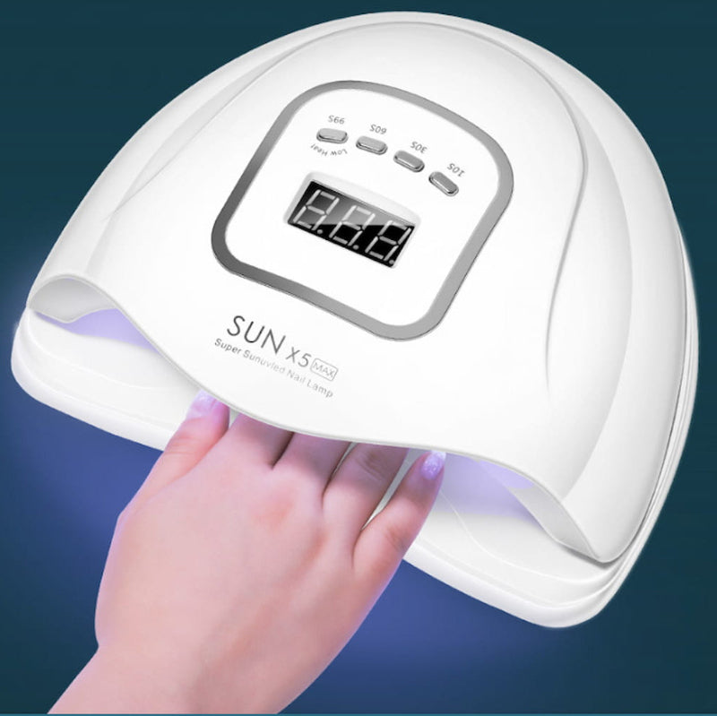 White portable UV LED nail lamp dryer for quick-drying gel nail polish and nail glue with a professional salon finish.